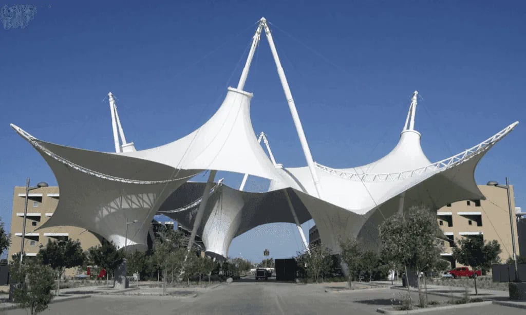 Large architectural conical tensile fabric membrane structure with tripod masts in Punjab