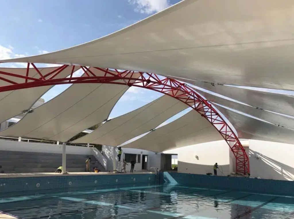 Structural steel arch swimming pool tensile membrane structure in Punjab