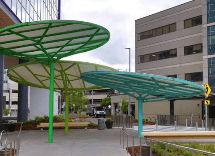 Architectural cantilevered leaf and disc shade canopies