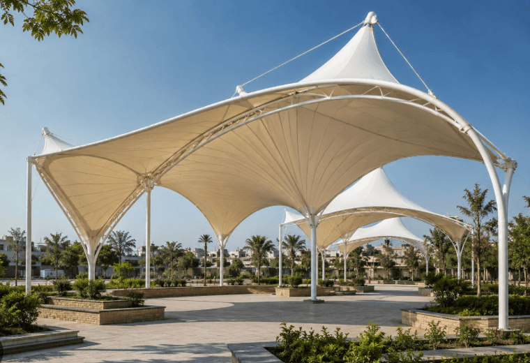 Large multi-conical custom tensile shade structure across public plaza