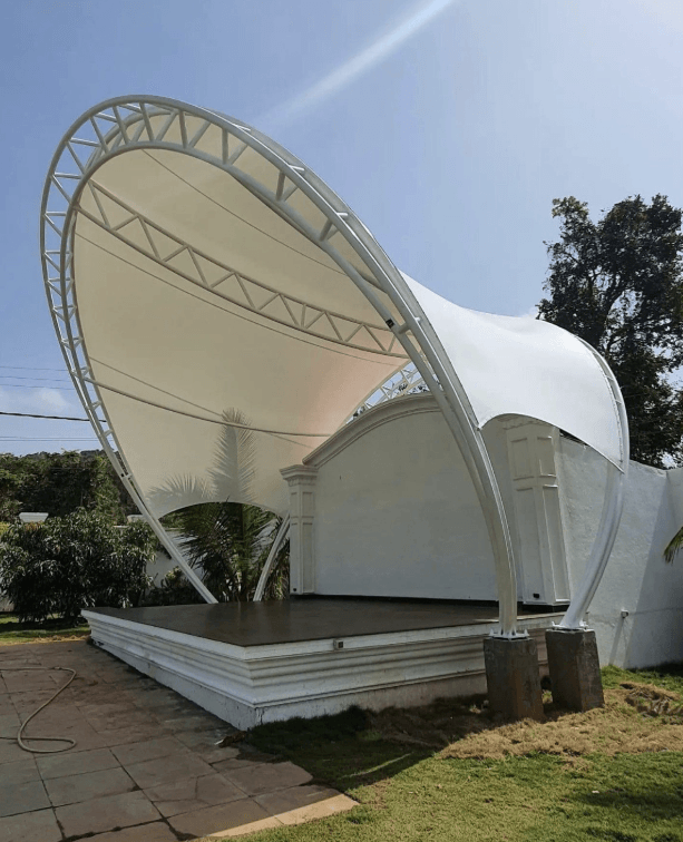 Custom structural steel arch amphitheater stage tensile canopy in Punjab