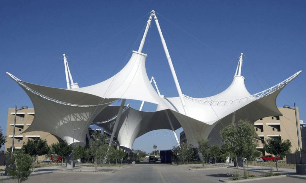 Large architectural conical tensile fabric membrane structure with tripod masts in Punjab
