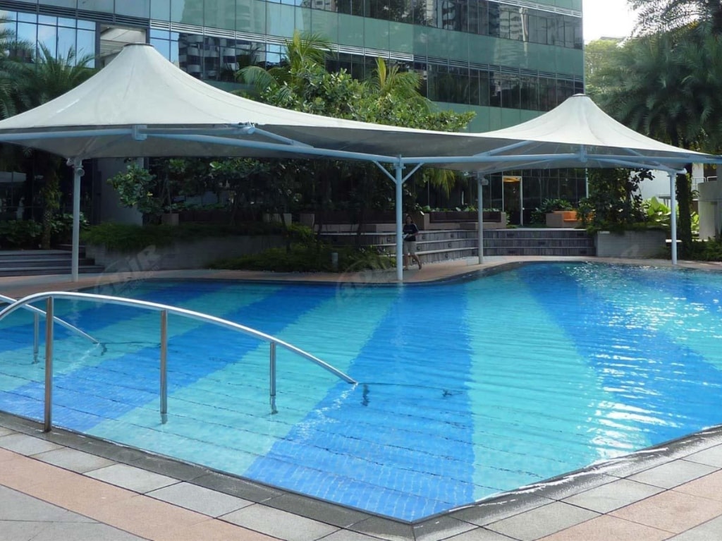 Swimming pool tension fabric shade canopy