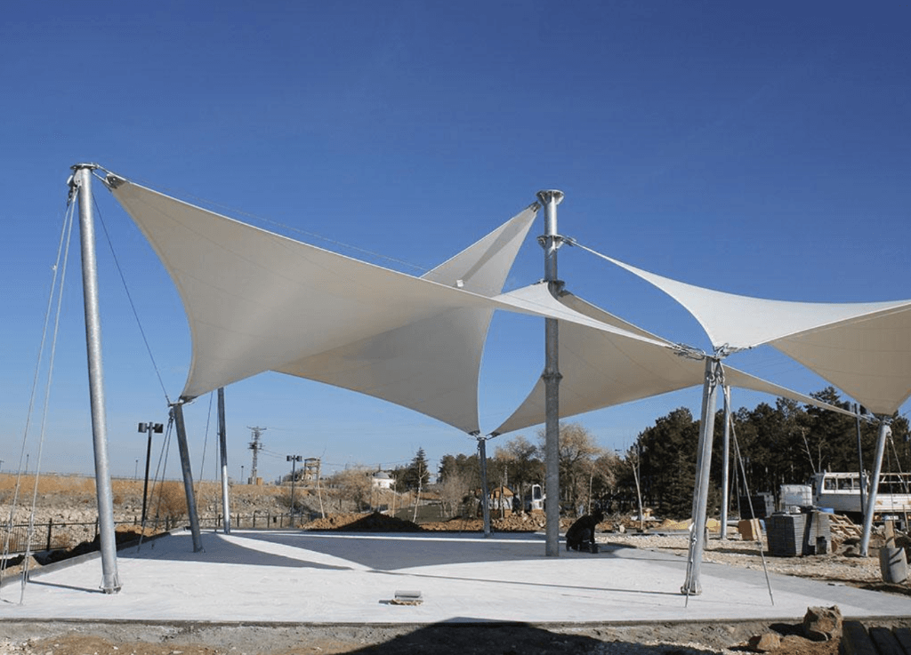 Tension membrane and structural steel parking shade engineering in Punjab